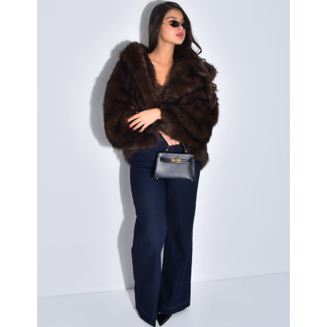 Veste oversize en fausse fourrure à capuche