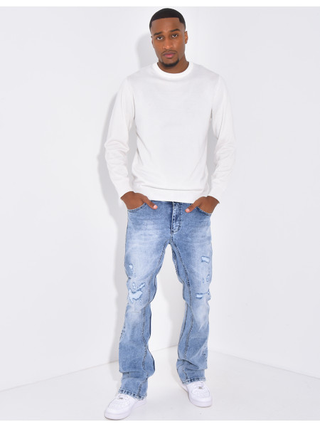 Jeans flare destroy à couture contrastante