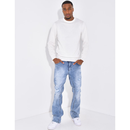 Jeans flare destroy à couture contrastante