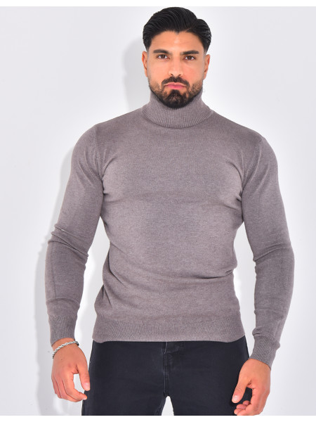 Long-sleeved turtleneck sweater.