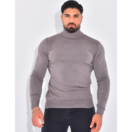 Long-sleeved turtleneck sweater.