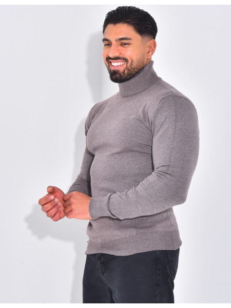 Long-sleeved turtleneck sweater.