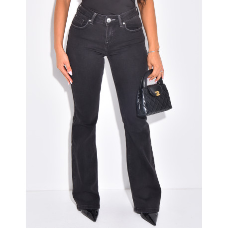 Low-rise flare jeans with rhinestone button pockets at the back