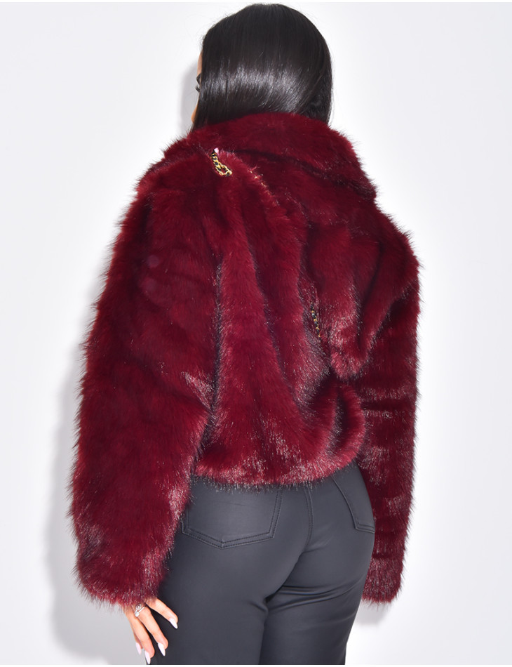 Veste courte en fausse fourrure zipée