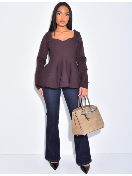 Jeans flare taille basse à poches boutons strass à l'arrière