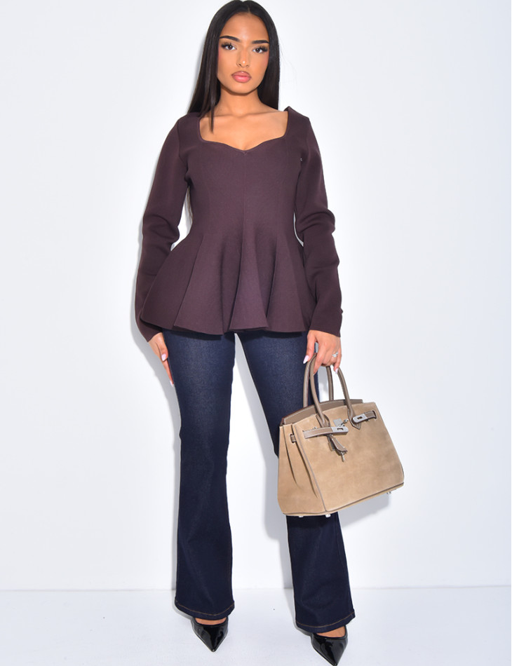 Jeans flare taille basse à poches boutons strass à l'arrière