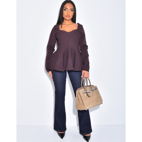 Jeans flare taille basse à poches boutons strass à l'arrière