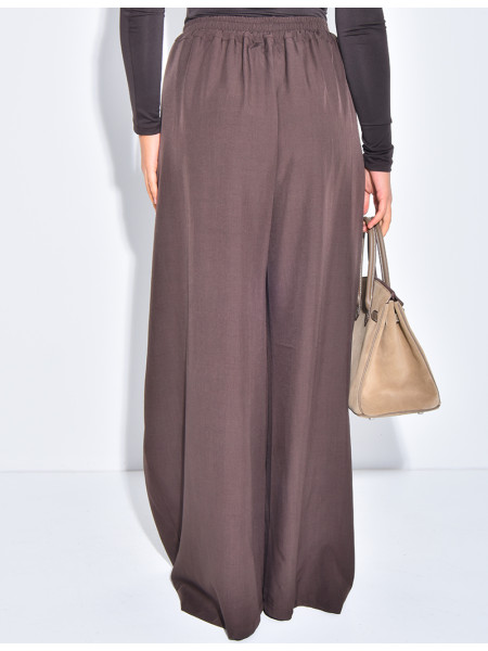 Wide-leg tailored trousers with a puffed effect