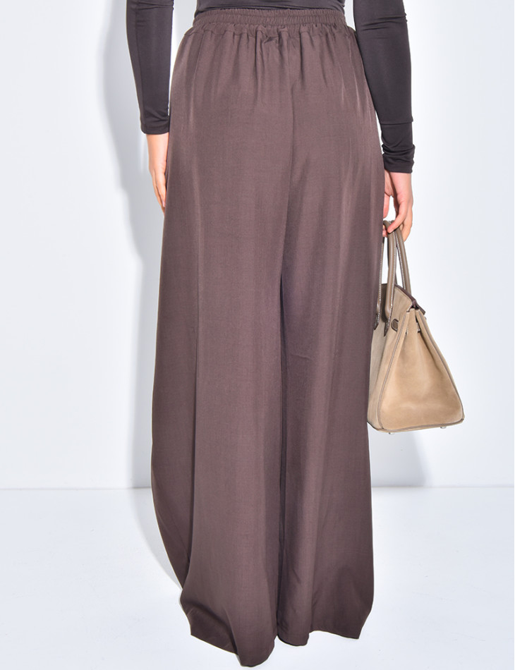 Wide-leg tailored trousers with a puffed effect