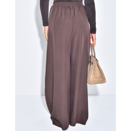 Wide-leg tailored trousers with a puffed effect