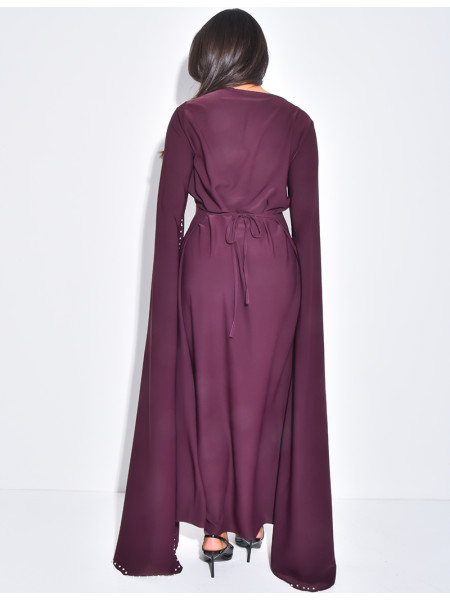 Long dress with slit sleeves adorned with pearls