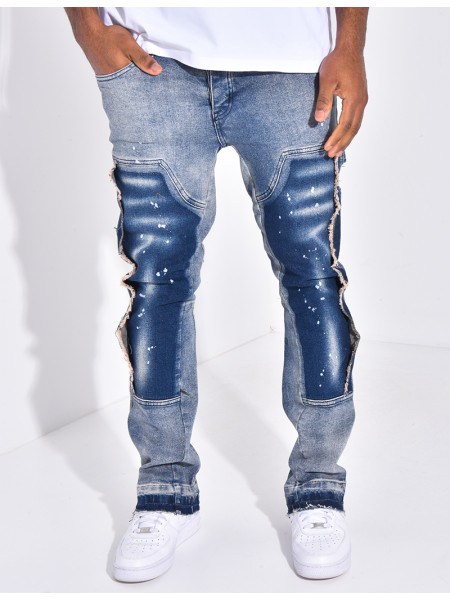 Jeans à empiècements contrastants et tâches de peinture