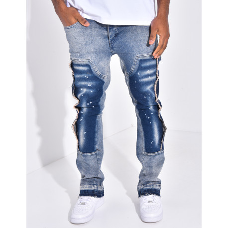 Jeans à empiècements contrastants et tâches de peinture