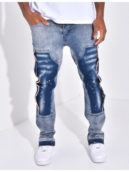 Jeans à empiècements contrastants et tâches de peinture