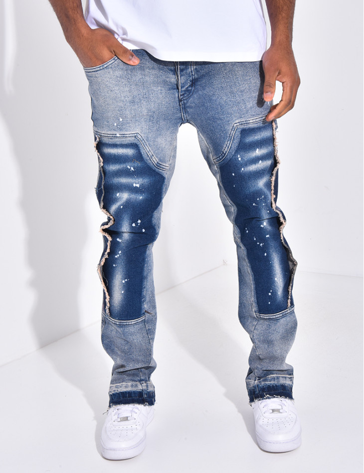 Jeans à empiècements contrastants et tâches de peinture