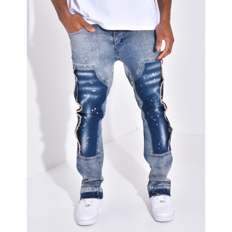 Jeans à empiècements contrastants et tâches de peinture