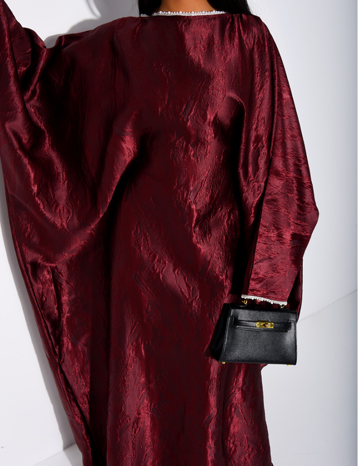 Robe ample à bordures en perles