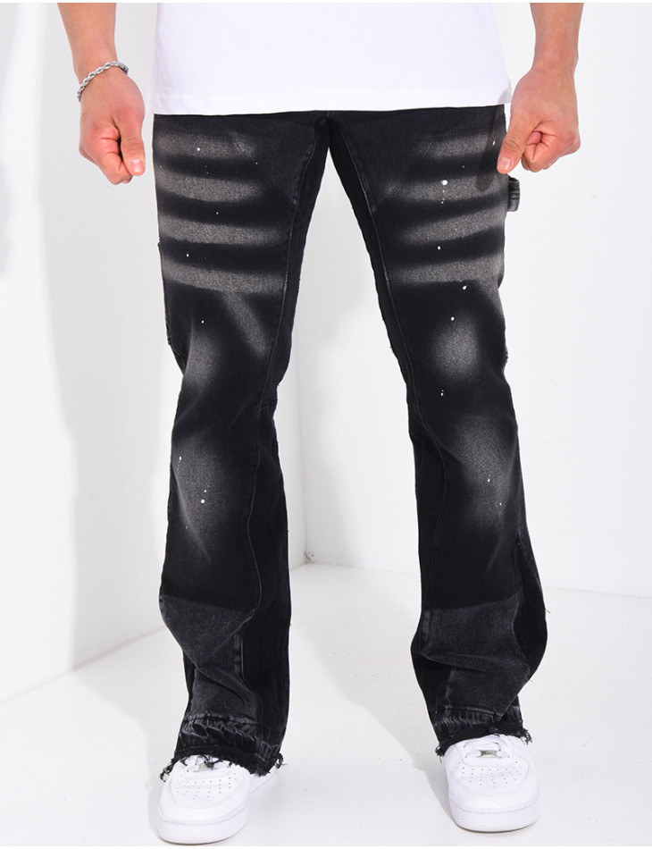 Jeans à tâches de peinture et lanière