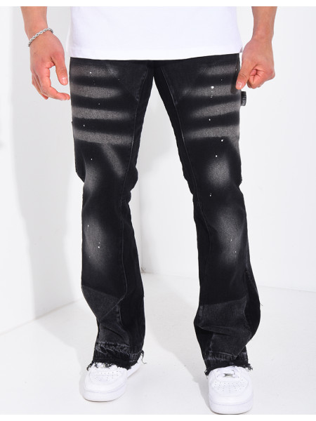 Jeans à tâches de peinture et lanière