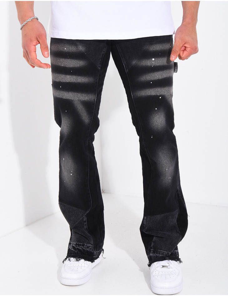 Jeans à tâches de peinture et lanière