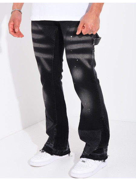 Jeans à tâches de peinture et lanière