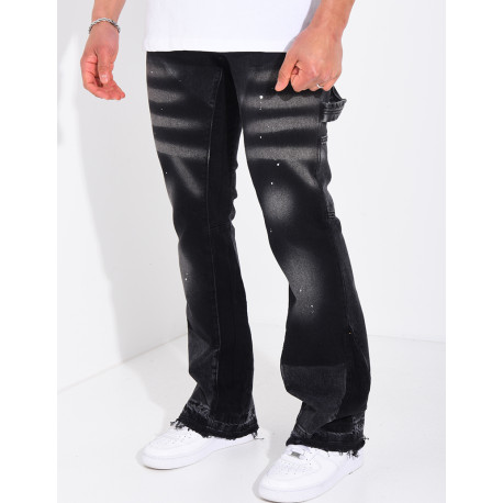 Jeans à tâches de peinture et lanière