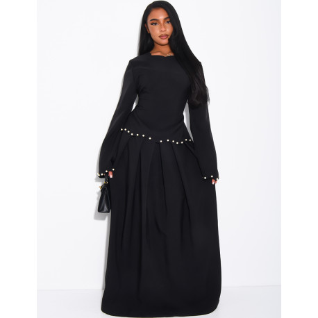 Long pleated skirt and fitted top with pearls