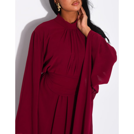 Long voile dress with high neck, flared sleeves and belt