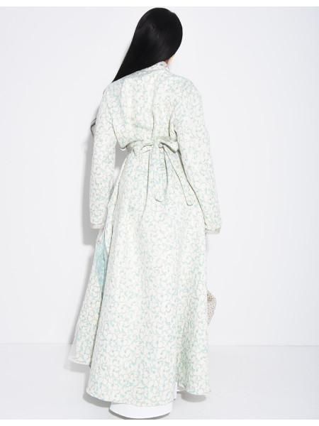 Caftan-style dress with sheer panels and rhinestones