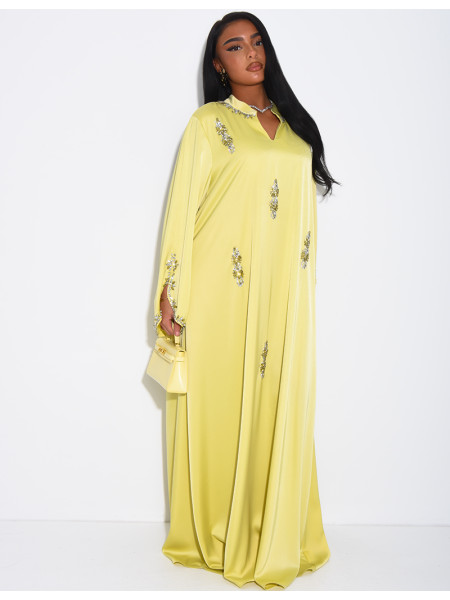 Loose-fitting satin abaya embellished with crystals