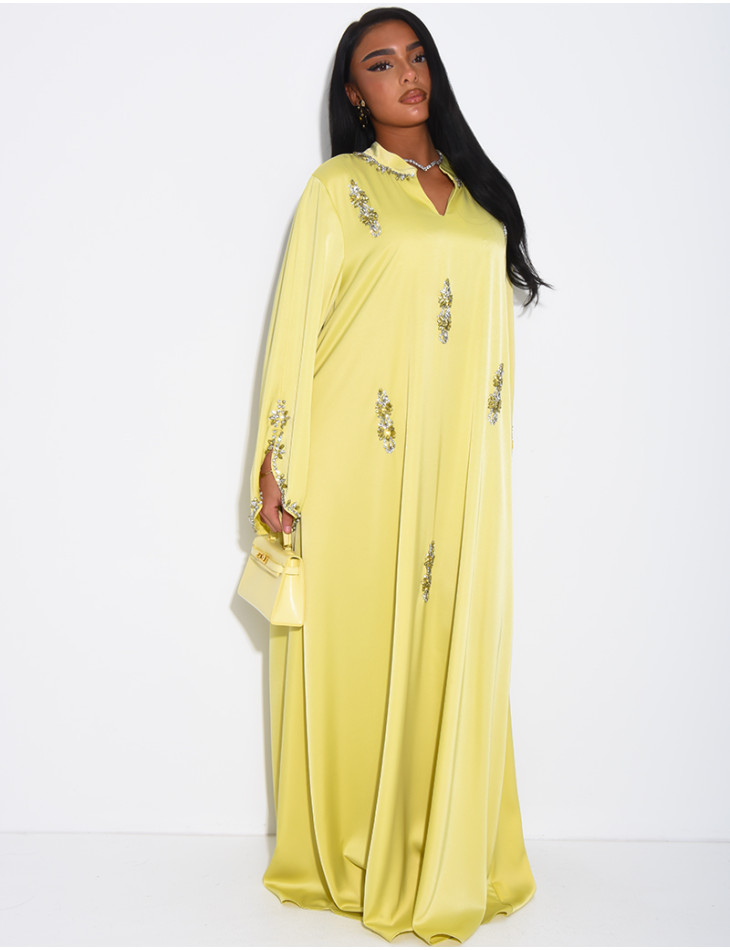 Loose-fitting satin abaya embellished with crystals