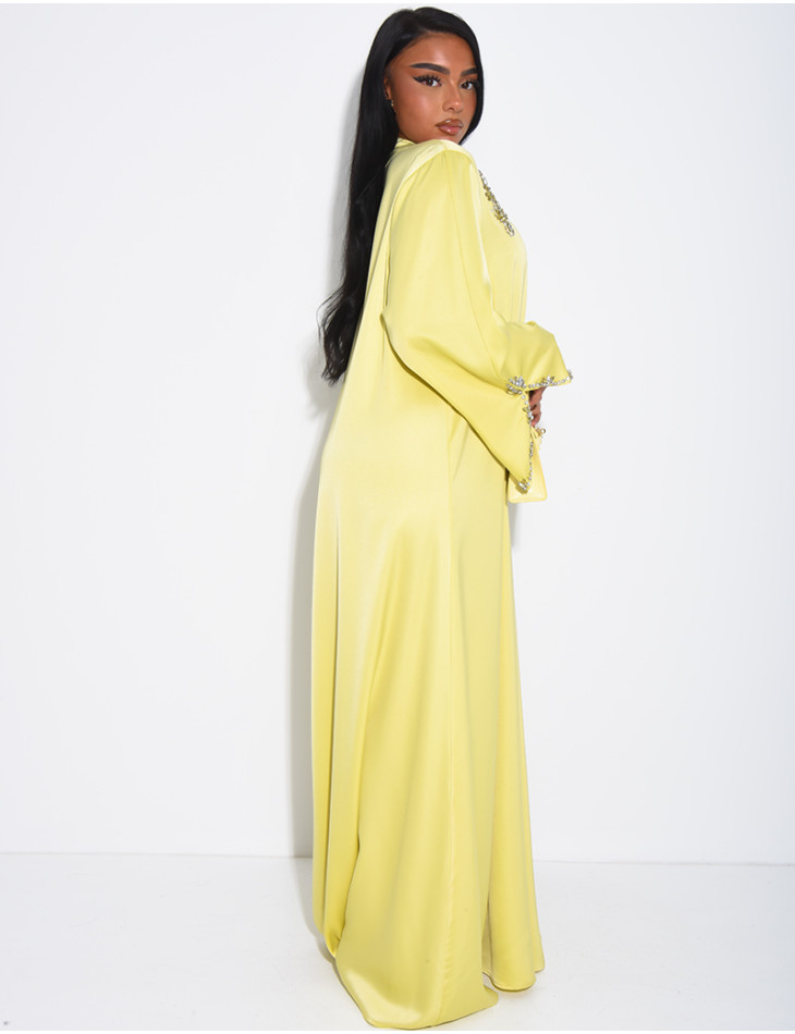 Loose-fitting satin abaya embellished with crystals