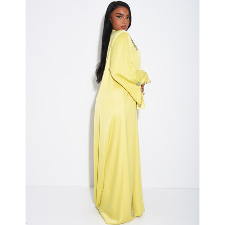 Loose-fitting satin abaya embellished with crystals