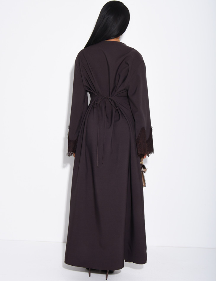 Long dress with a tie-back detail and lace trim