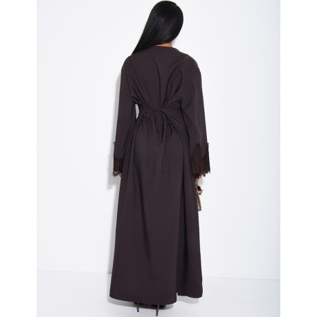 Long dress with a tie-back detail and lace trim