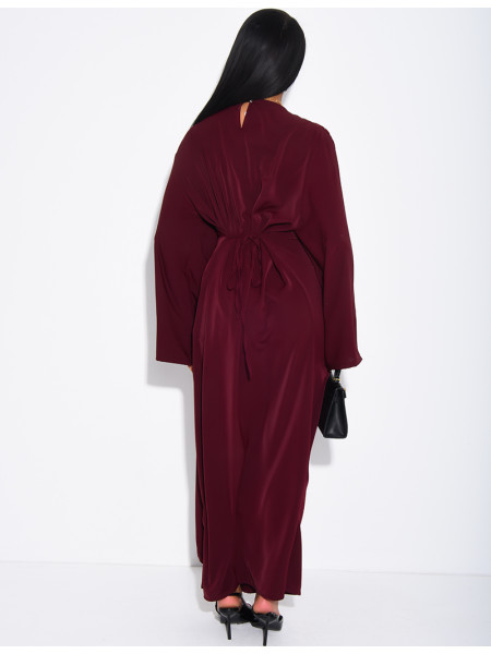 Long dress with a cape featuring lace panels