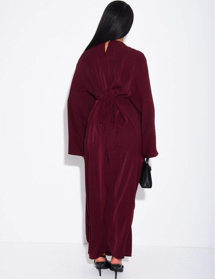 Long dress with a cape featuring lace panels