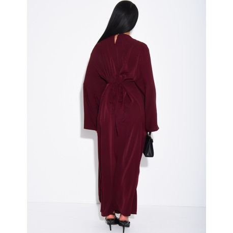 Long dress with a cape featuring lace panels