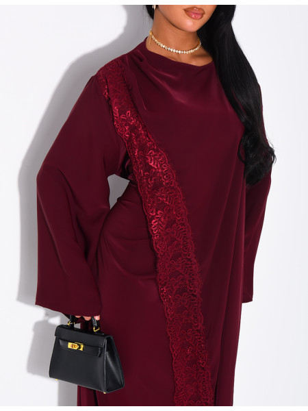 Long dress with a cape featuring lace panels