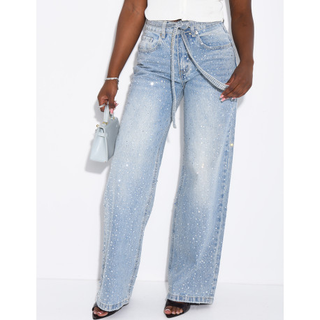 Wide-leg jeans covered in rhinestones with a matching belt