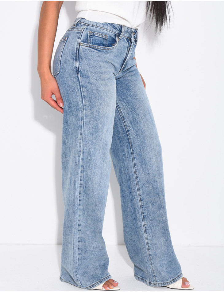 Low-rise, wide-leg faded jeans