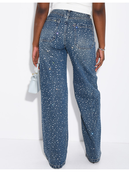 Wide-leg jeans covered in rhinestones with a matching belt