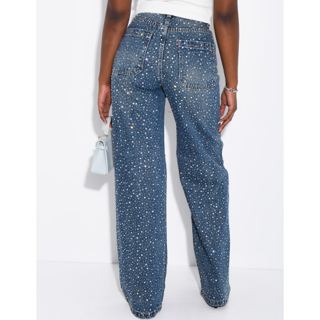 Wide-leg jeans covered in rhinestones with a matching belt
