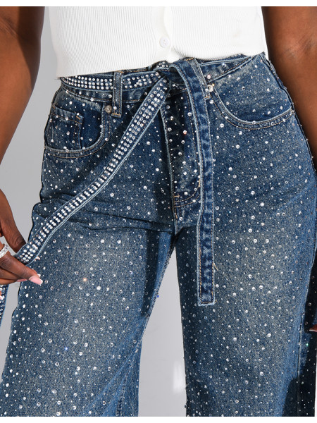 Wide-leg jeans covered in rhinestones with a matching belt