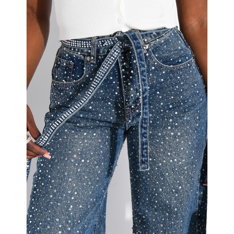 Wide-leg jeans covered in rhinestones with a matching belt