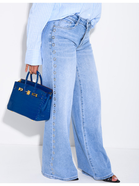 Jeans coupe droite à oeillets