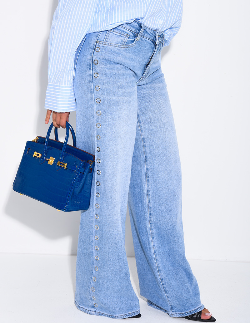 Jeans coupe droite à oeillets