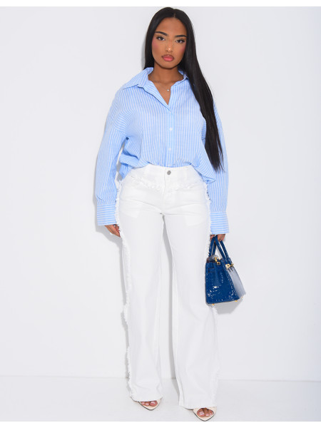 Jeans coupe large taille moyenne à coutures effilochées