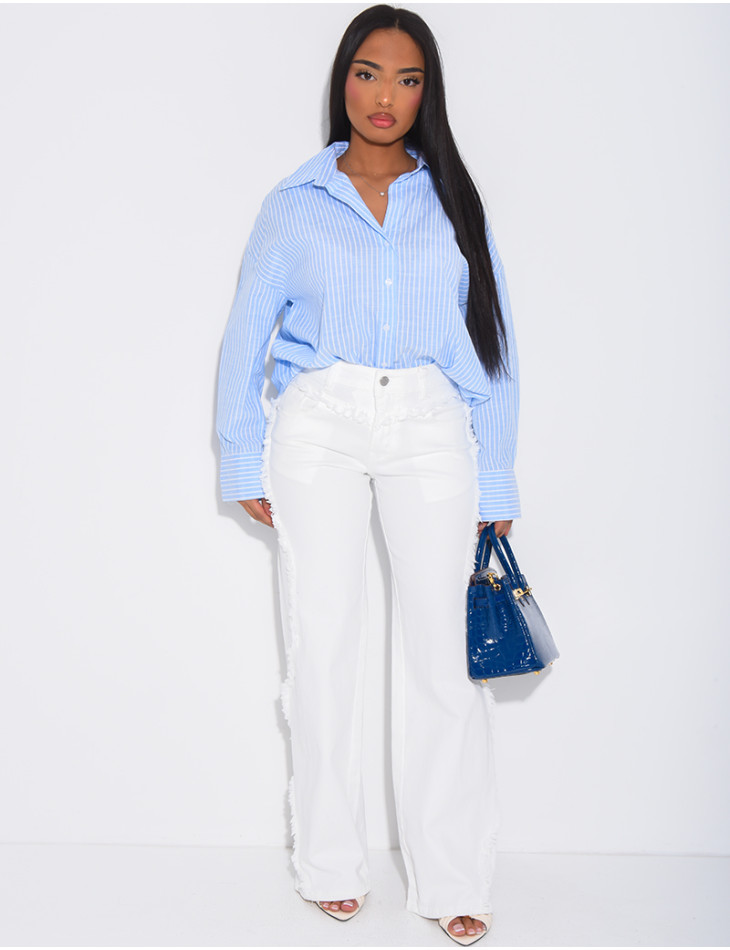 Jeans coupe large taille moyenne à coutures effilochées