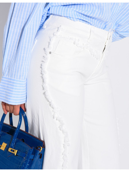 Jeans coupe large taille moyenne à coutures effilochées